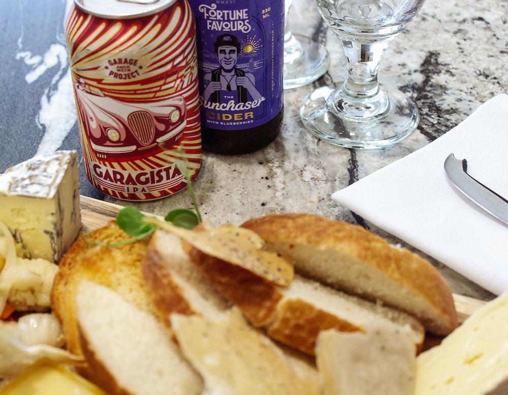 Bolton Hotel Wellington Esterno foto A cheese board with a can of Carachia